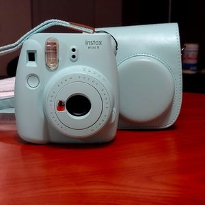 Light Blue Fujifilm - mini 9 instant film camera